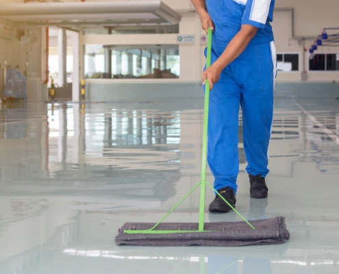 Janitor cleaning manufacturing facility