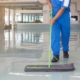 Janitor cleaning manufacturing facility