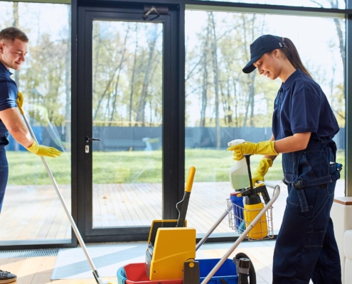 janitors cleaning commercial building