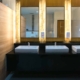 Commercial bathroom with three sinks