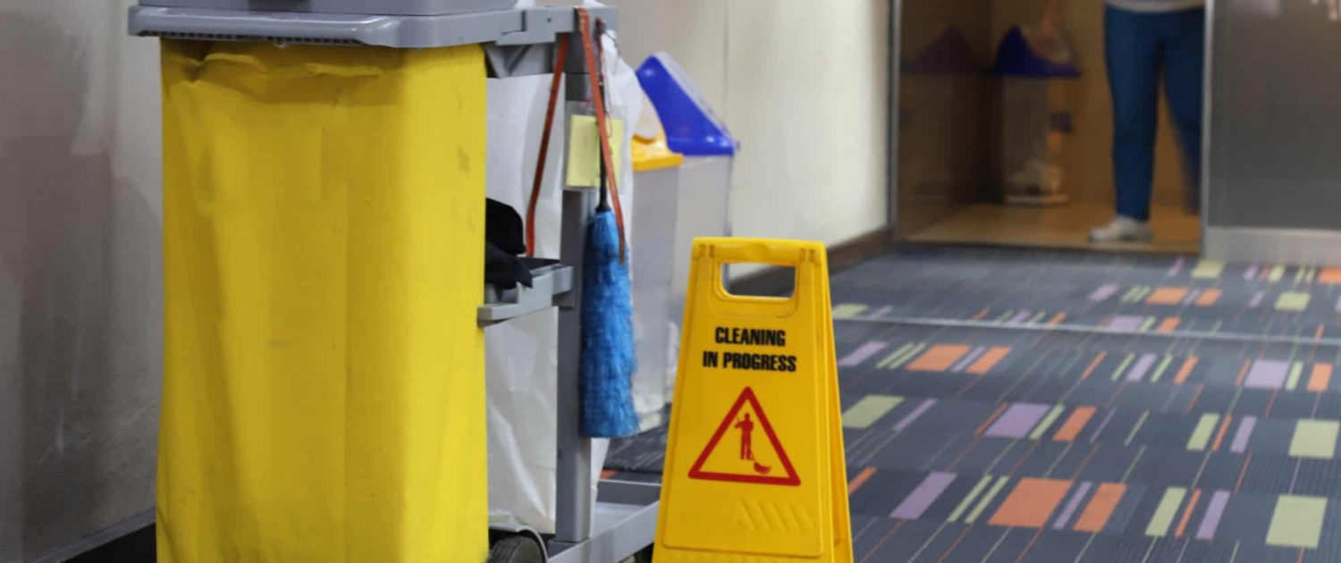 Hotel day porter working on cleaning public areas